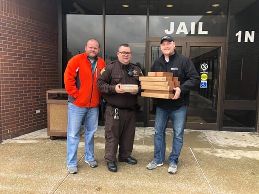 Mike & Cory delivering doughnuts from Rise n Roll Bakery