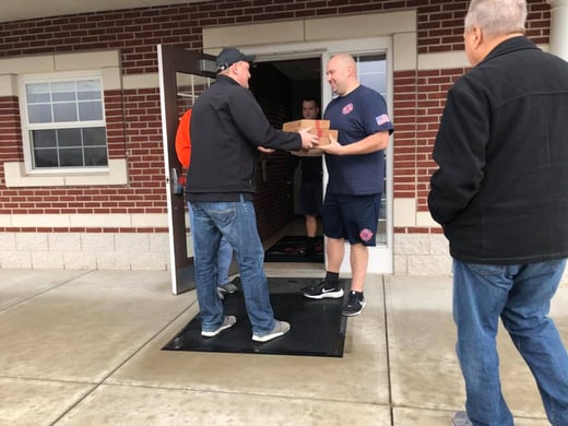 Mike & Cory delivering doughnuts from Rise n Roll Bakery