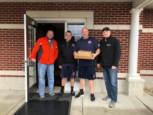 Mike & Cory delivering doughnuts from Rise n Roll Bakery