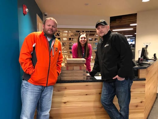 Mike & Cory delivering doughnuts from Rise n Roll Bakery